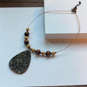 Elegant Brown Beaded Pendant Necklace